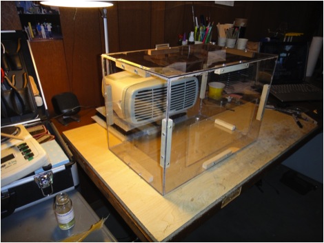 Filter setup – Polycarbonate box with hole cut in back for HEPA filter and working hole in front to provide negative pressure and airflow into the box