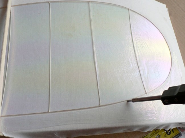 Figure 9. Excess film is removed in the normal way.