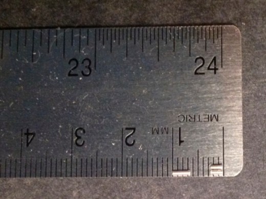 Figure 16: Finished screws: spring screw on the left and low and high pitch stop screws on the right