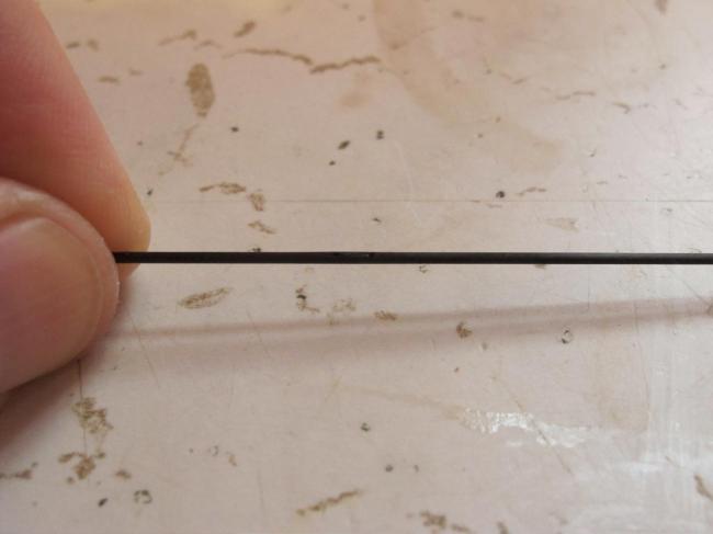 Tube turned slightly to show both holes